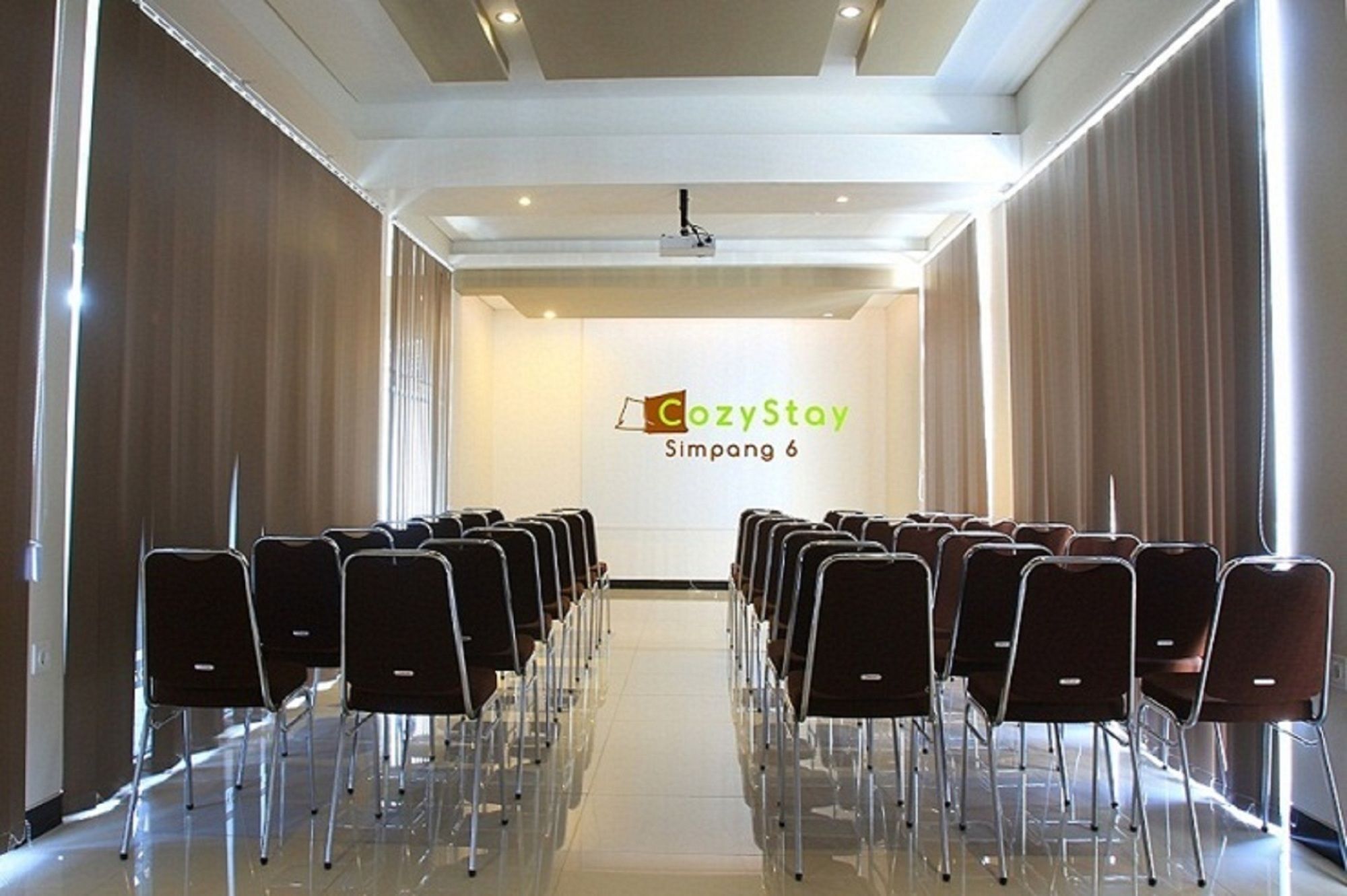 โคซี สเตย์ โฮเต็ล ซิมปัง เอนัม Hotel เดนปาซาร์ ภายนอก รูปภาพ